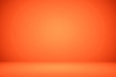 Empty orange studio room, used as background for display your products